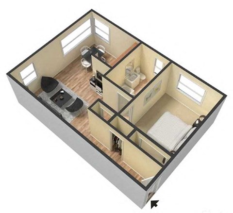 a small bedroom is shown with a bed and a desk